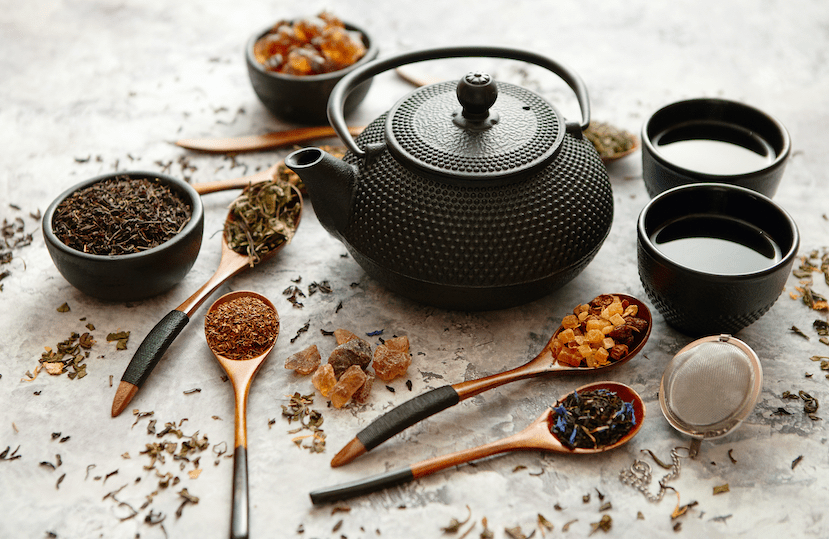 Traditional Chinese medicine with teapot and herbal teas